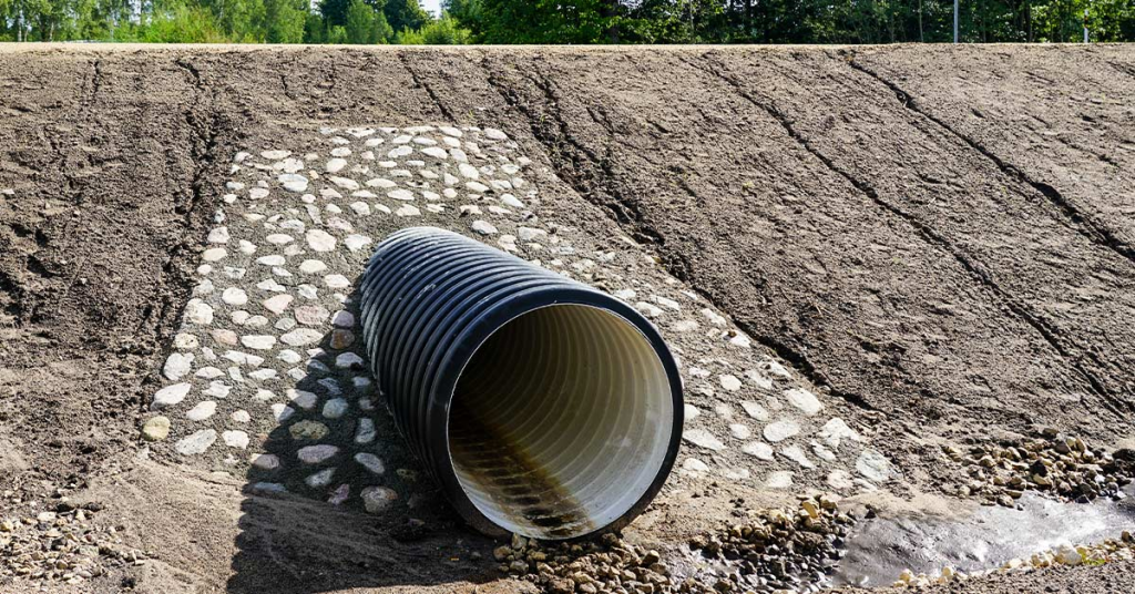 Culvert being installed for drainage on a residential site in Bluff Dale, Erath County TX