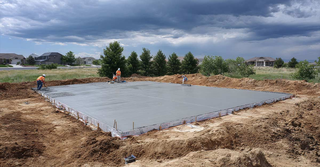 Foundation pad being built and compacted in Stephenville TX clay soil by 3BW Excavation